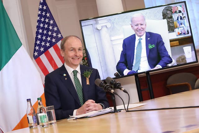 Taoiseach Micheal Martin speaking with United States President Joe Biden via video link in the Government Buildings, Dublin (Julien Behal Photography/PA)