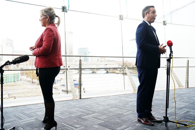 Deputy First Minister Michelle O’Neill and Northern Ireland First Minister Paul Givan speaking to the media at the ICC in Belfast following the signing of the Belfast Region City Deal in December (Brian Lawless/PA)