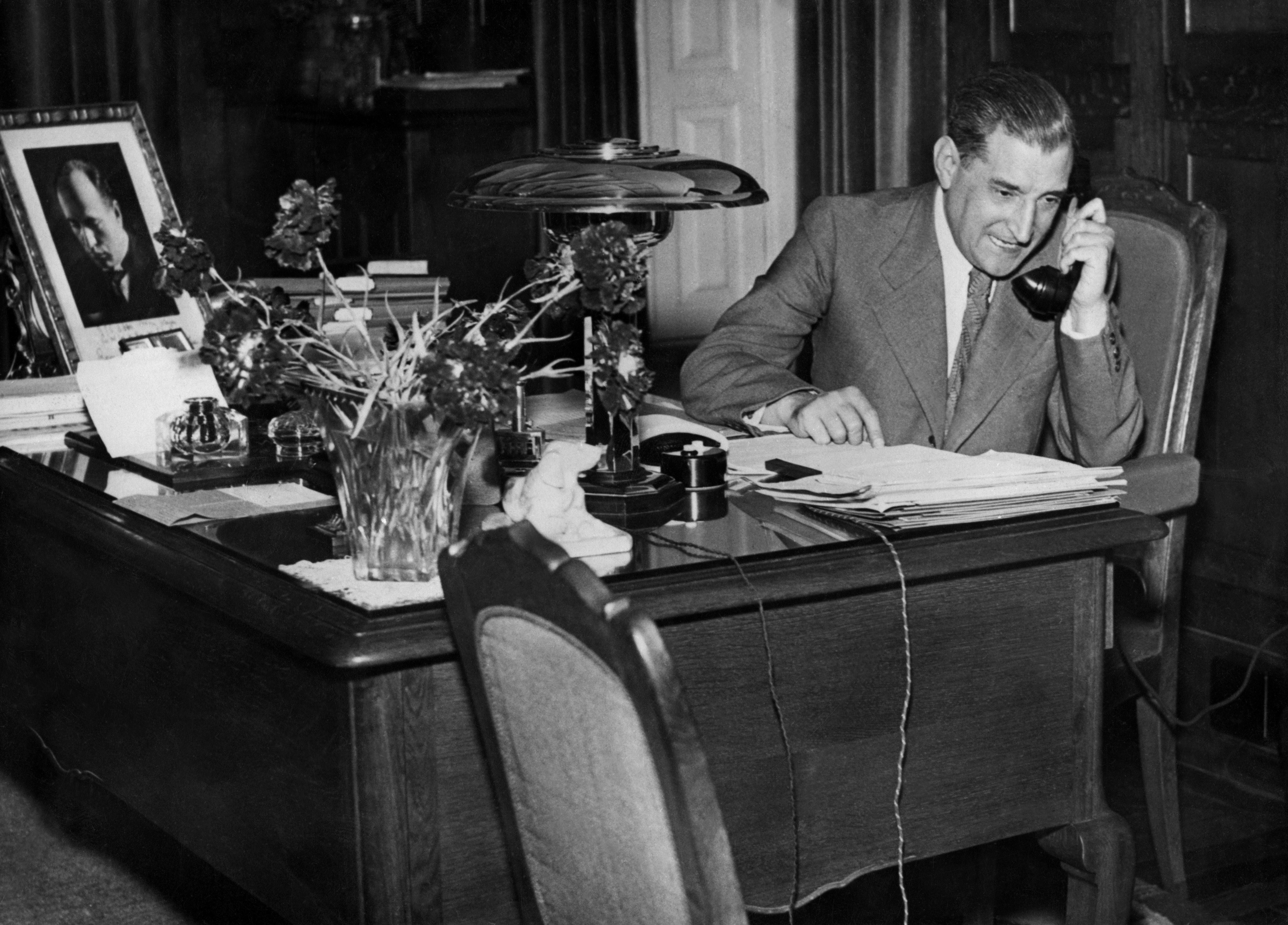 Archive photo: The late Portuguese president Antonio de Oliveira Salazar talking on the phone at his desk