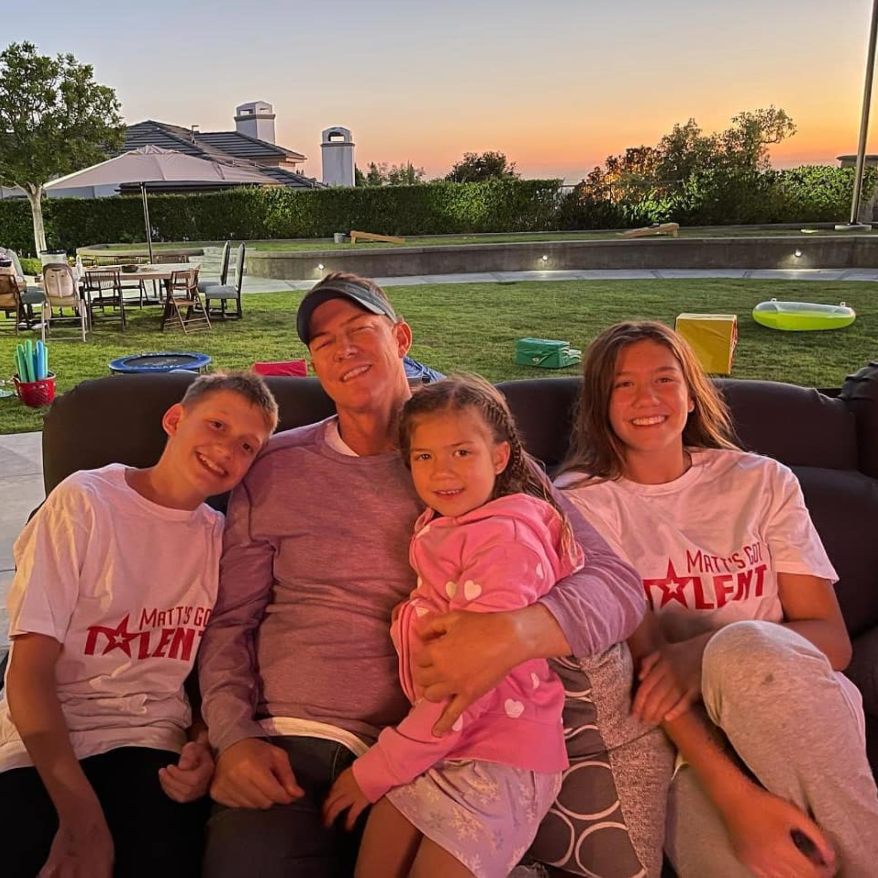 Matt Mauser, now a single father, enjoys a sunset with kids Thomas, Ivy, and Penny