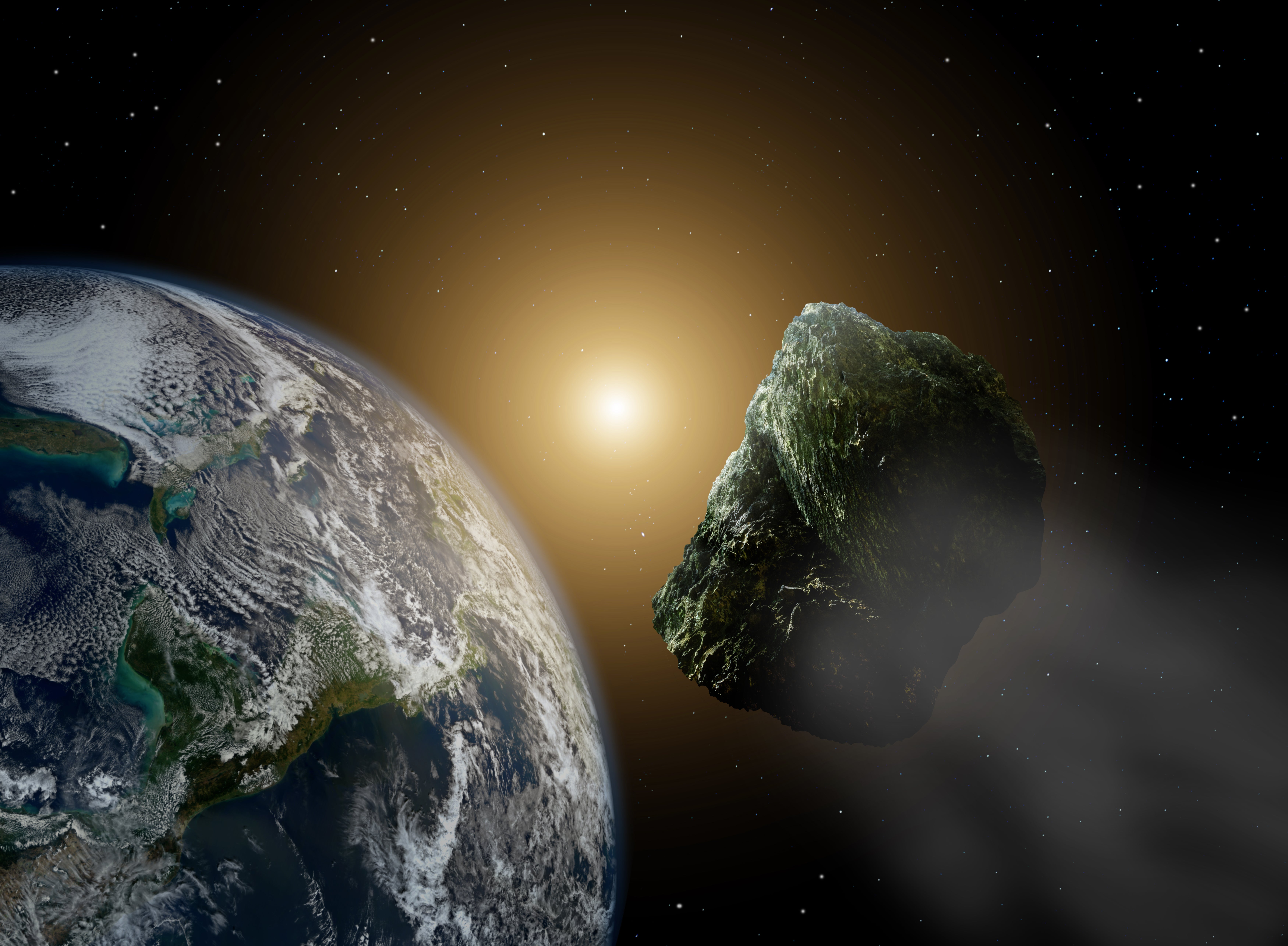 An artist’s rendering of an asteroid passing near Earth.