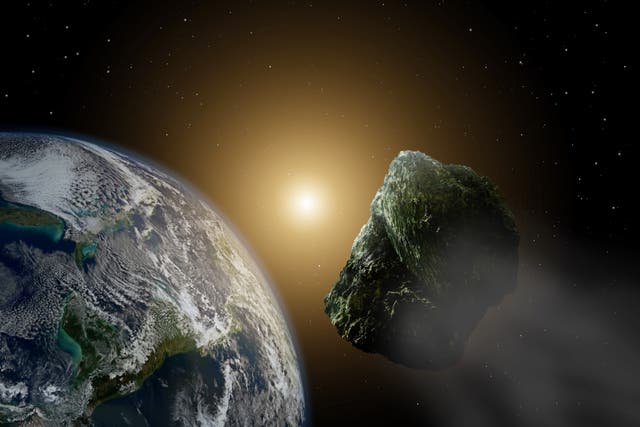 <p>An artist’s rendering of an asteroid passing near Earth. </p>