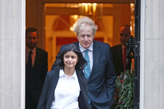 <p>Boris Johnson pictured in December 2020 with Munira Mirza, director of the No 10 Policy Unit, who resigned on Thursday </p>