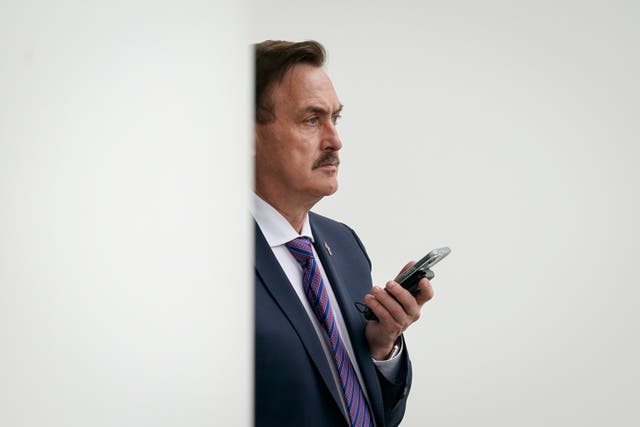<p>MyPillow CEO Mike Lindell waits outside the West Wing of the White House before entering on January 15, 2021 in Washington, DC. (Photo by Drew Angerer/Getty Images)</p>
