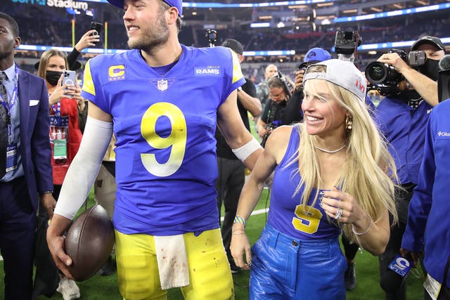<p>Matthew Stafford of the Los Angeles Rams and his wife Kelly Stafford celebrate after the Rams defeated the San Francisco 49ers on 30 January 2022 in Inglewood, California</p>