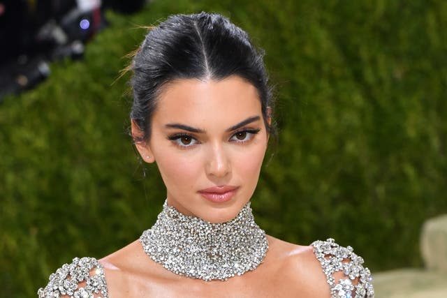 <p>Kendall Jenner faces criticism after sharing photo of her drinking tequila through a straw</p>
