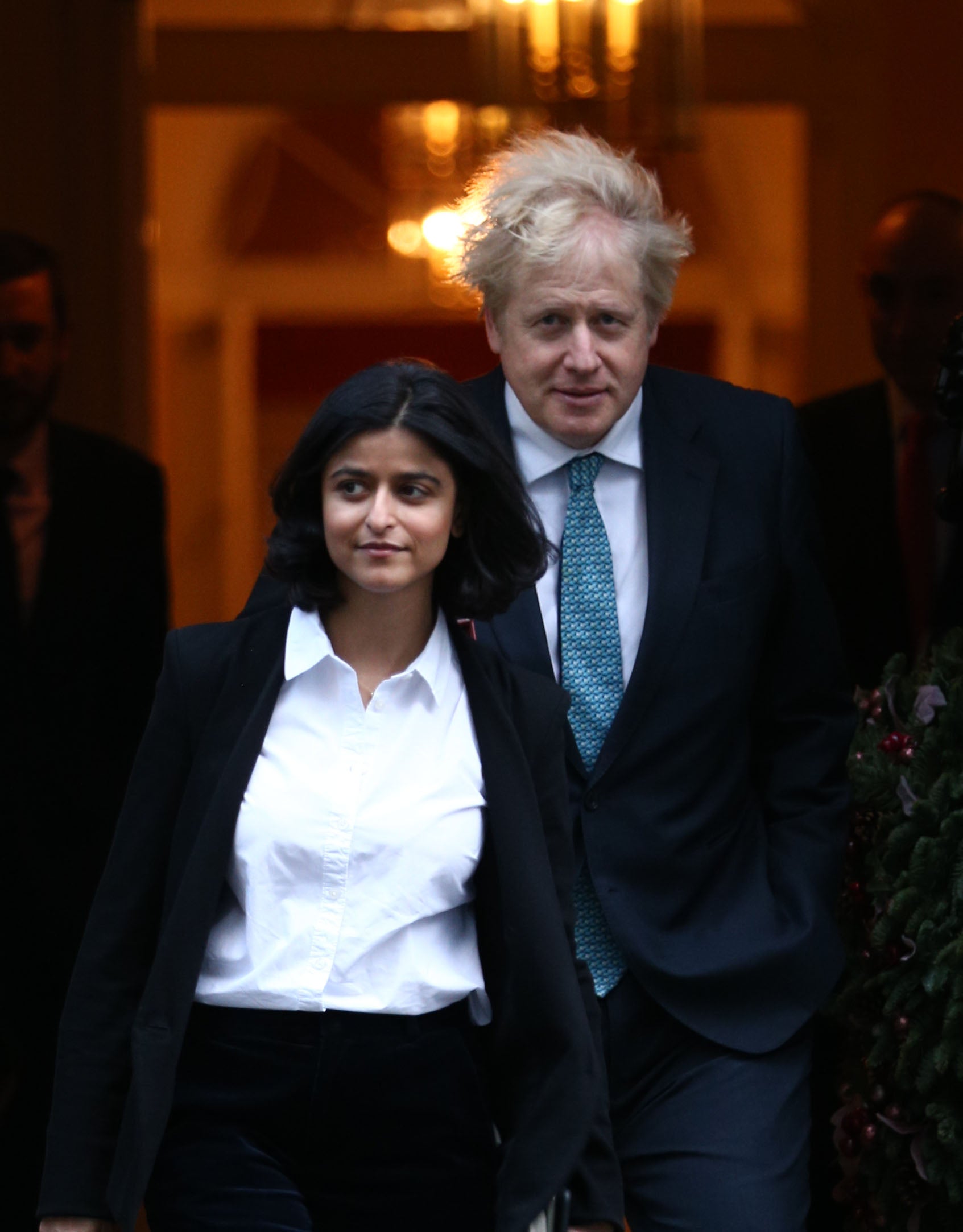 Prime Minister Boris Johnson and long-time ally Munira Mirza pictured leaving No 10 (Yui Mok/PA)