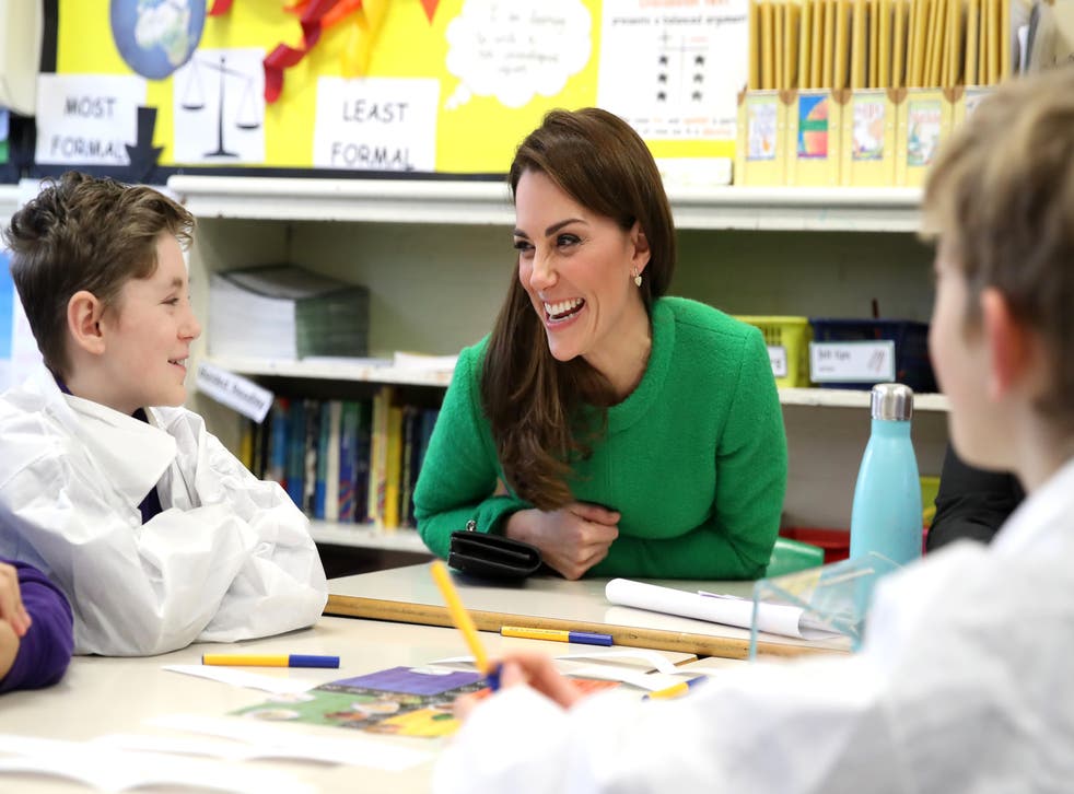 The Duchess of Cambridge talks to pupils during a visit to Lavender Primary School in Enfield, north London, in support of Place2Be’s Children’s Mental Health Week 2019 (PA)