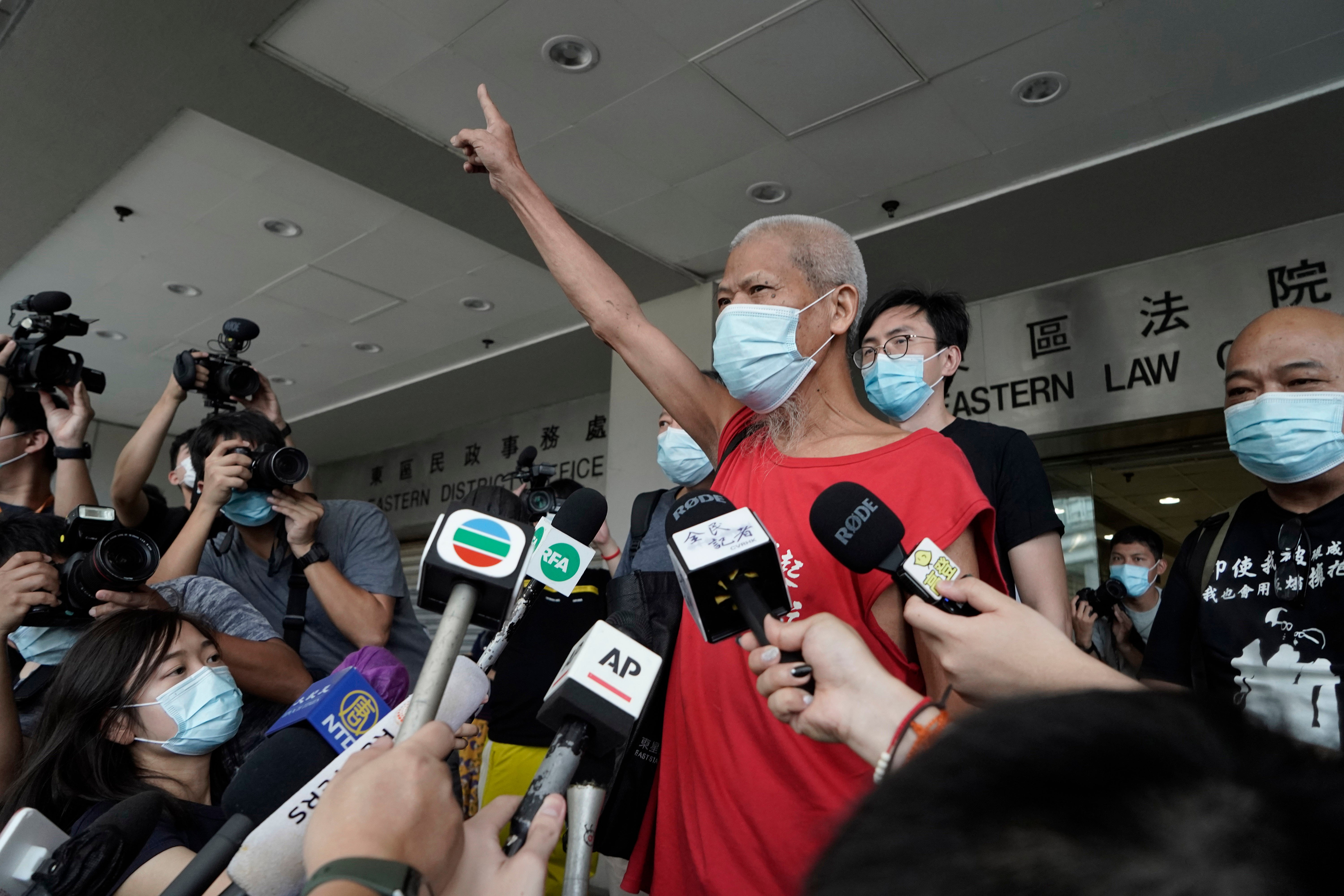 File photo: Hong Kong activist Koo Sze-yiu speaks to the media after arriving at a court in Hong Kong on 30 September 2020