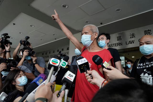 <p>File photo: Hong Kong activist Koo Sze-yiu speaks to the media after arriving at a court in Hong Kong on 30 September 2020</p>