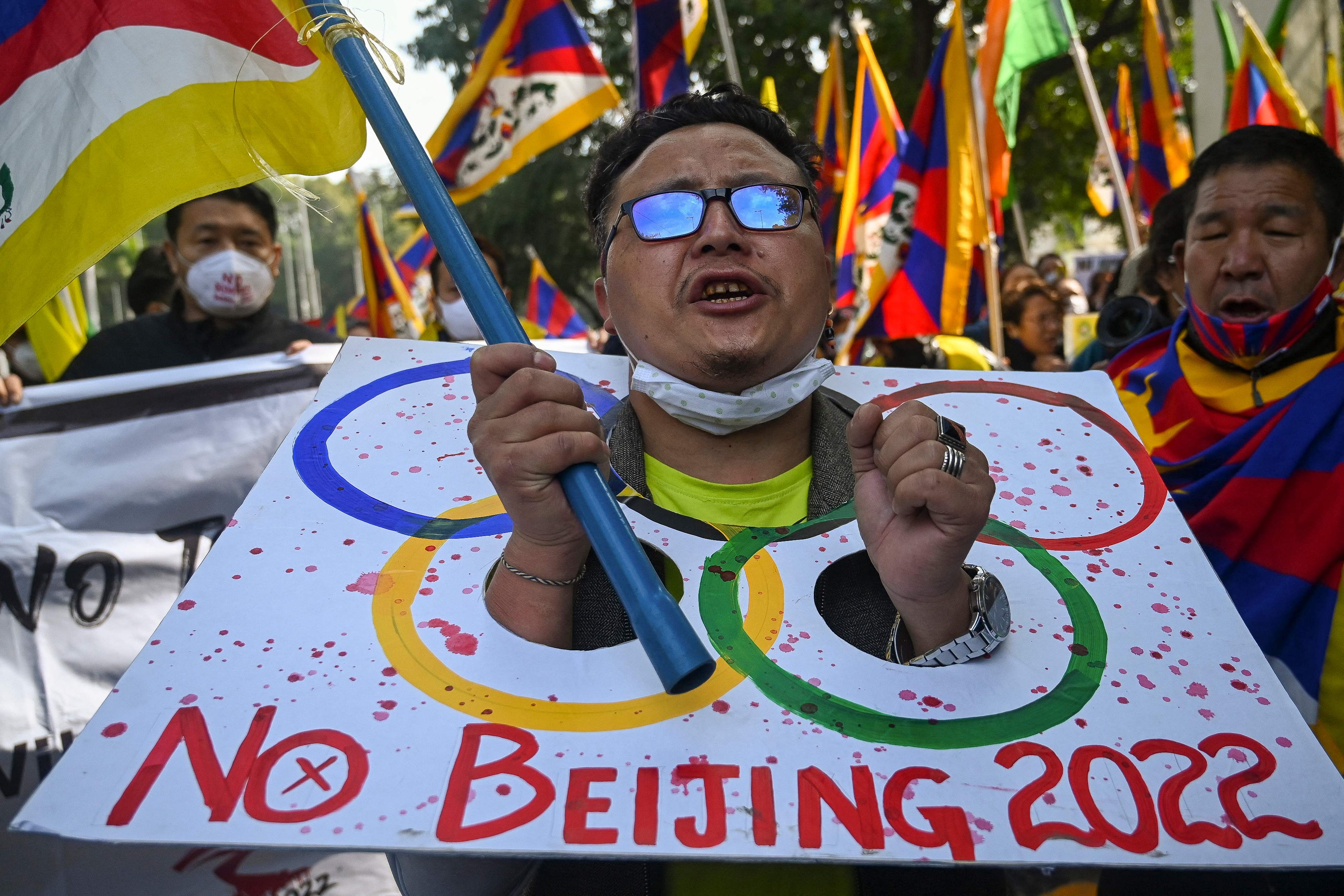Tibetan activists attend a protest in New Delhi, India