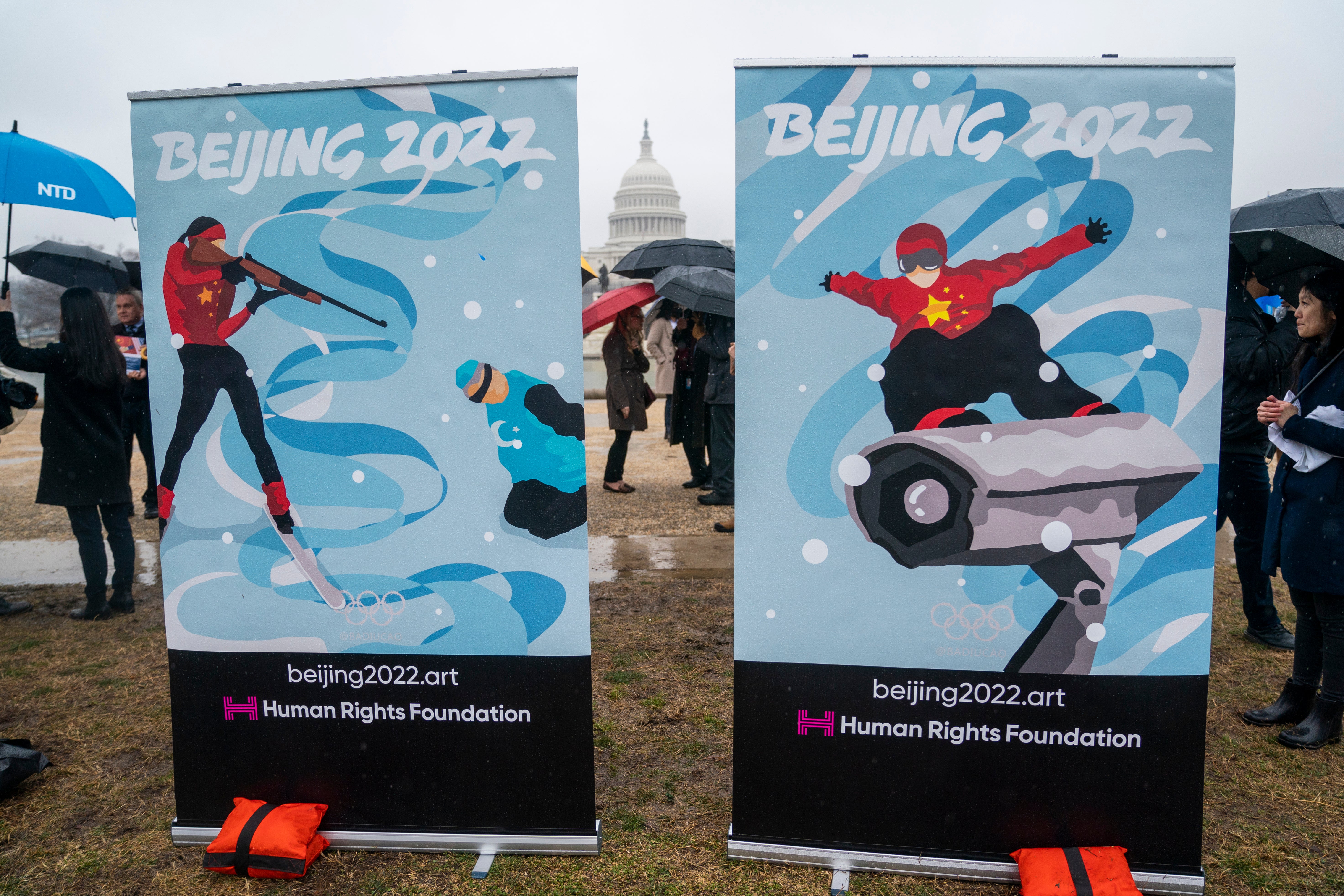 Activists protest against the Olympic Winter Games near the US Capitol in Washington
