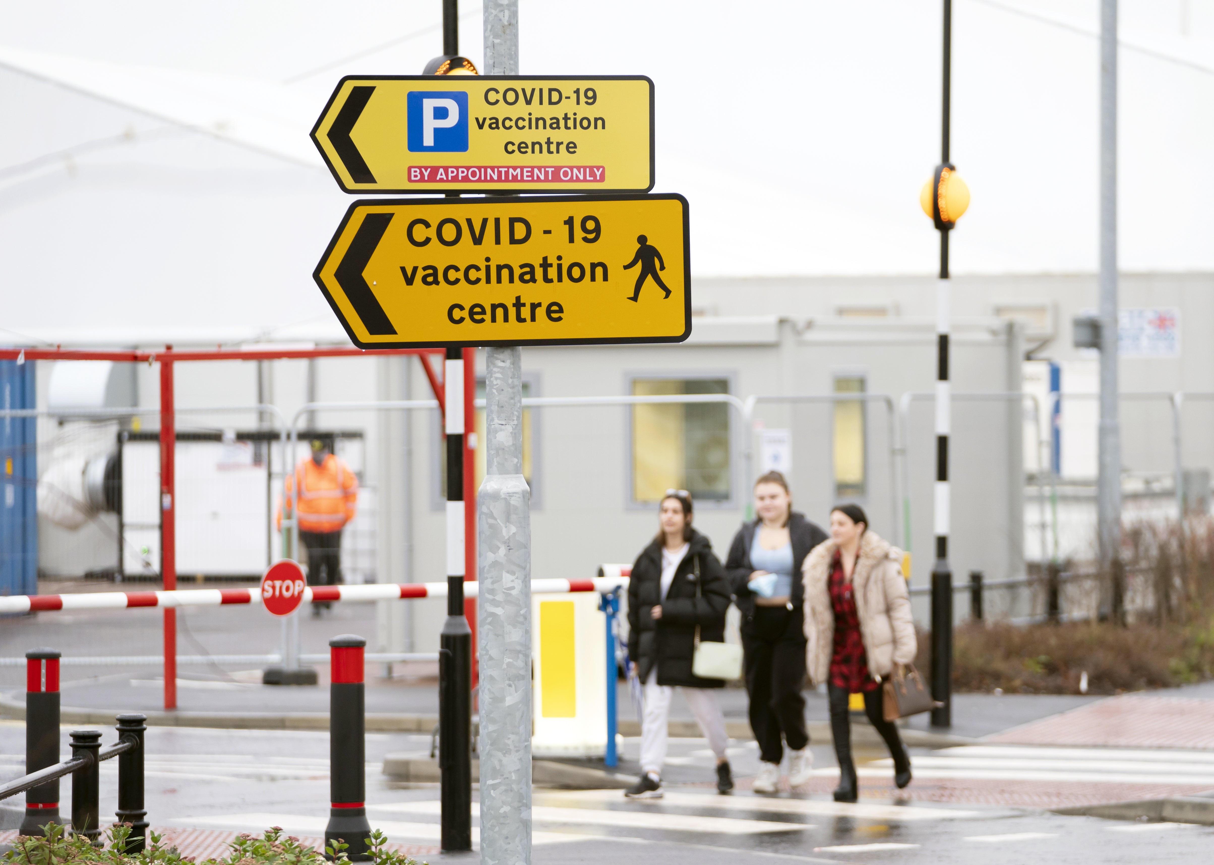 People arrive at a vaccination centre at Elland Road in Leeds (Danny Lawson/PA)