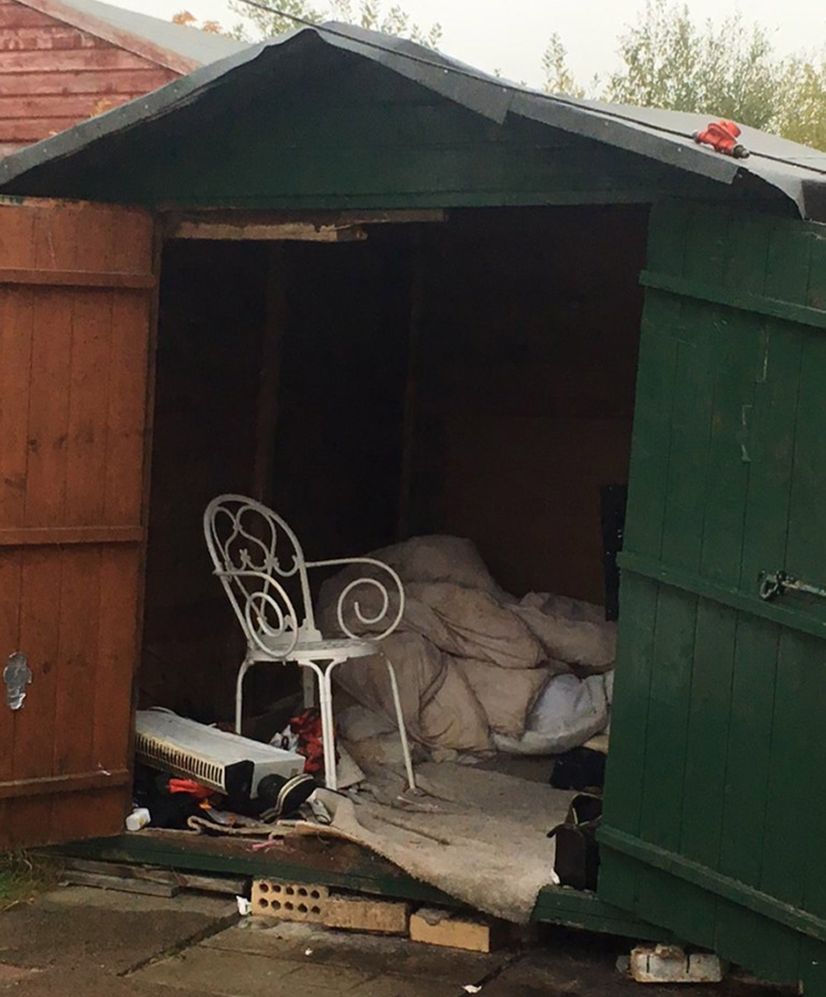 The man was found living in a cramped shed without heating or lighting and a soiled duvet on the floor