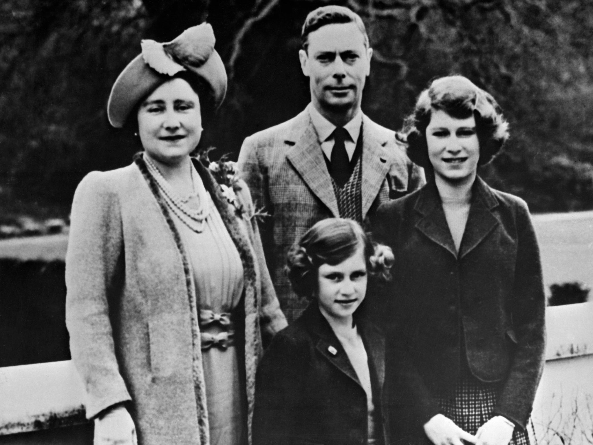 The Queen (right) with her mother, Queen Elizabeth, father, King George VI and sister Princess Margaret in 1938