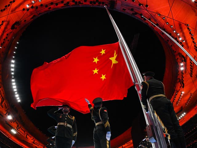 <p>The Chinese national flag is raised during the opening ceremony of the Beijing 2022 Winter Olympic Game</p>