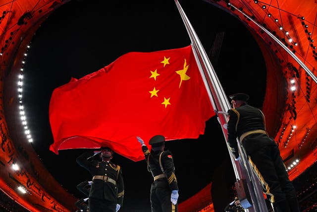 <p>The Chinese national flag is raised during the opening ceremony of the Beijing 2022 Winter Olympic Game</p>