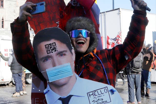 <p>A protester against Covid vaccine mandates imposed by prime minister Justin Trudeau </p>