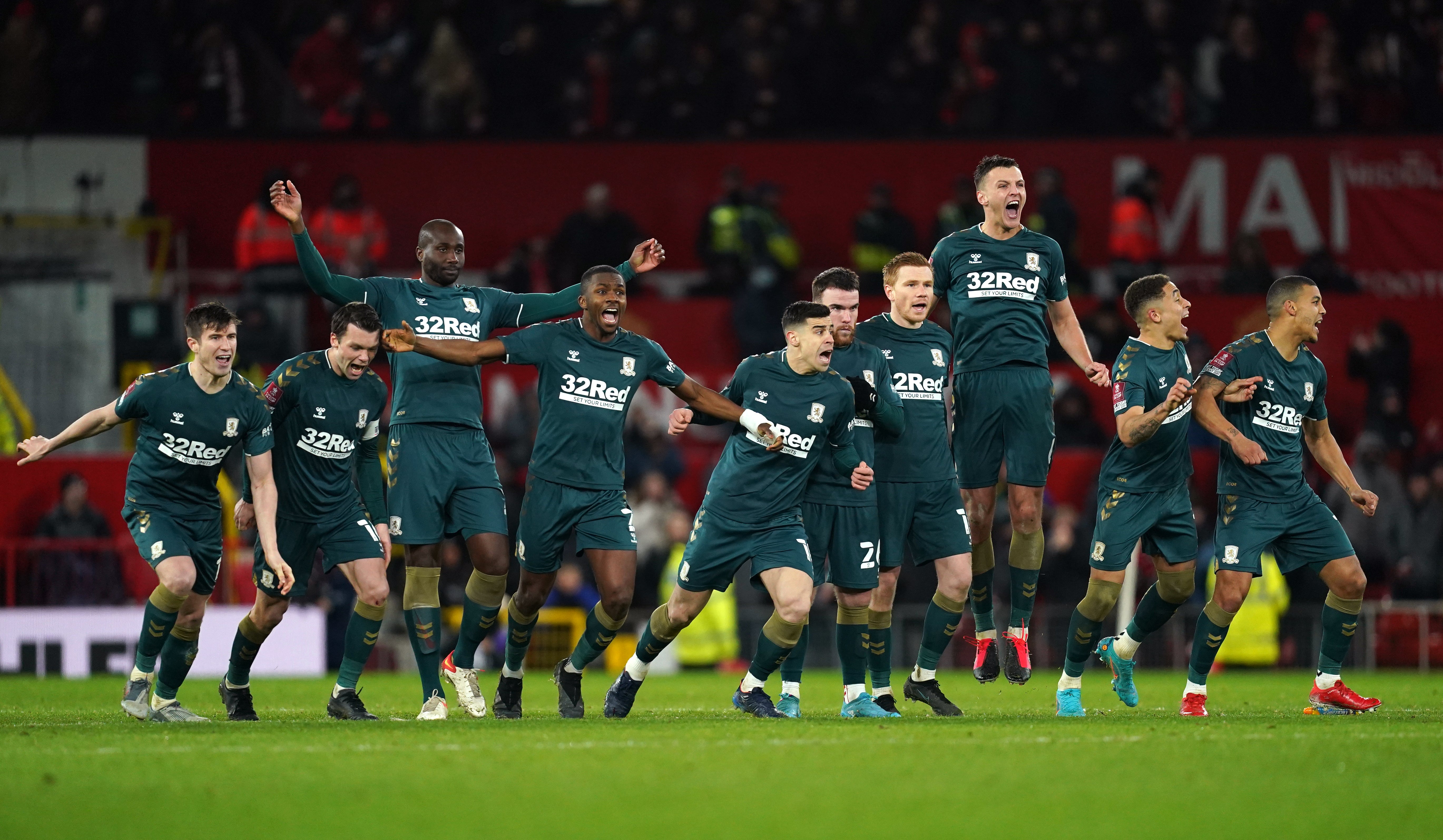 Middlesbrough celebrate winning the penalty shootout (Martin Rickett/PA).