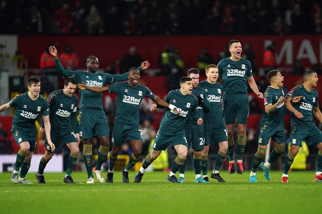 <p>Middlesbrough celebrate winning the penalty shootout (Martin Rickett/PA).</p>
