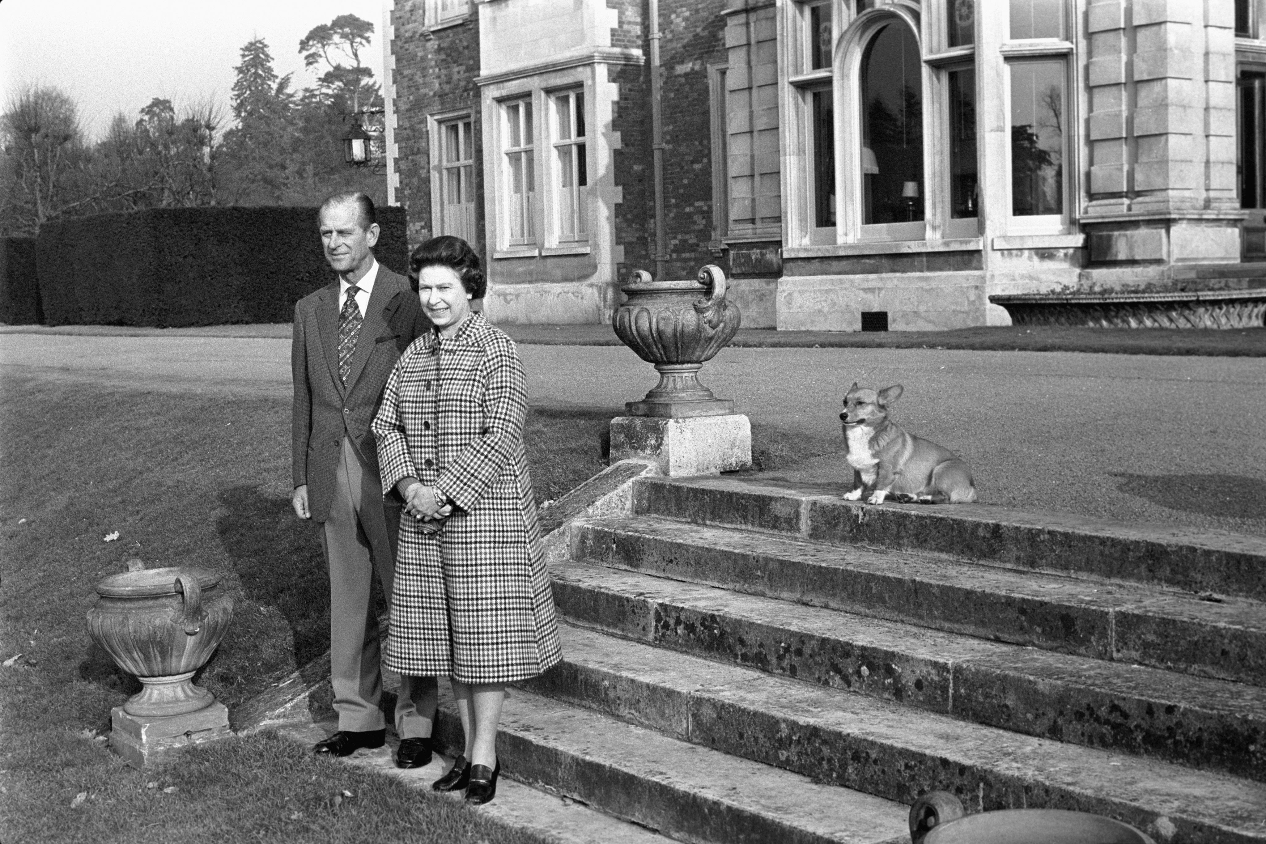 The Queen and the Duke of Edinburgh posing in the grounds of Sandringham House, Norfolk, to mark the 30th anniversary of the Queen’s accession to the throne (Ron Bell/PA)