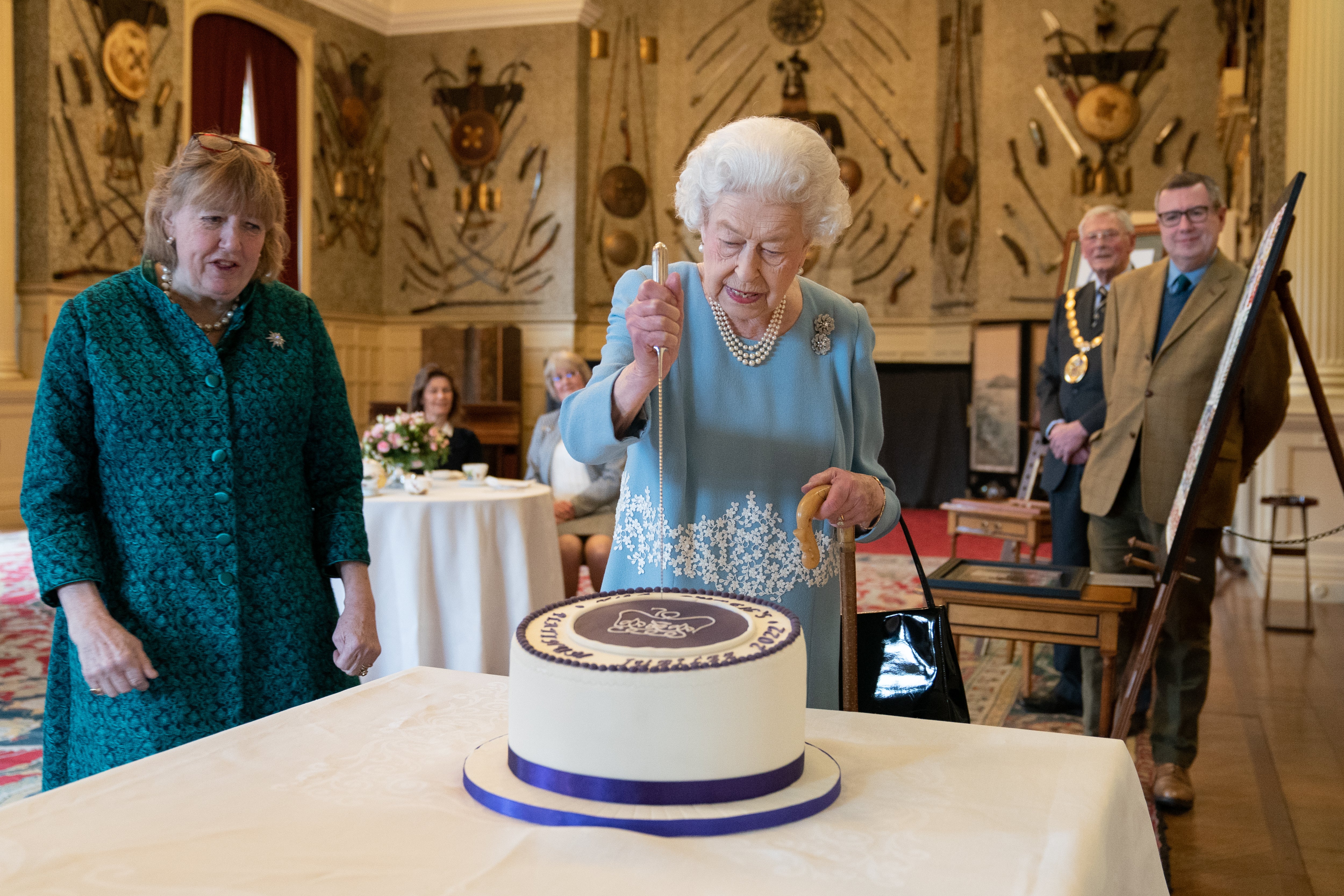 The Queen cutting her Jubilee cake (Joe Giddens/PA)