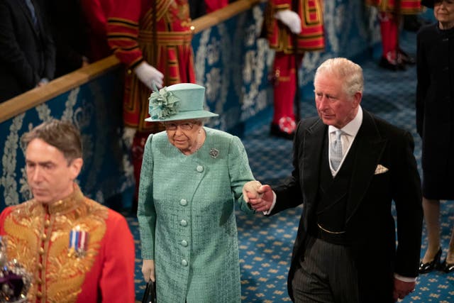 The Queen accompanied by the Prince of Wales (Matt Dunham/PA)