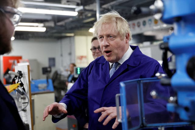 Prime Minister Boris Johnson during a visit to the technology centre at Hopwood Hall College in Manchester (Jason Cairnduff/PA)