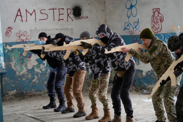 Local residents attend an all-Ukrainian training day close to Kyiv (Efrem Lukatsky/AP)