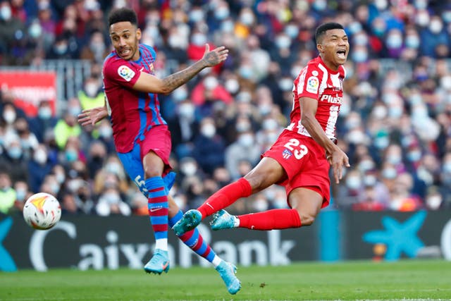Pierre-Emerick Aubameyang made his Barcelona debut in a lively match against Atletico Madrid (Joan Monfort/AP)