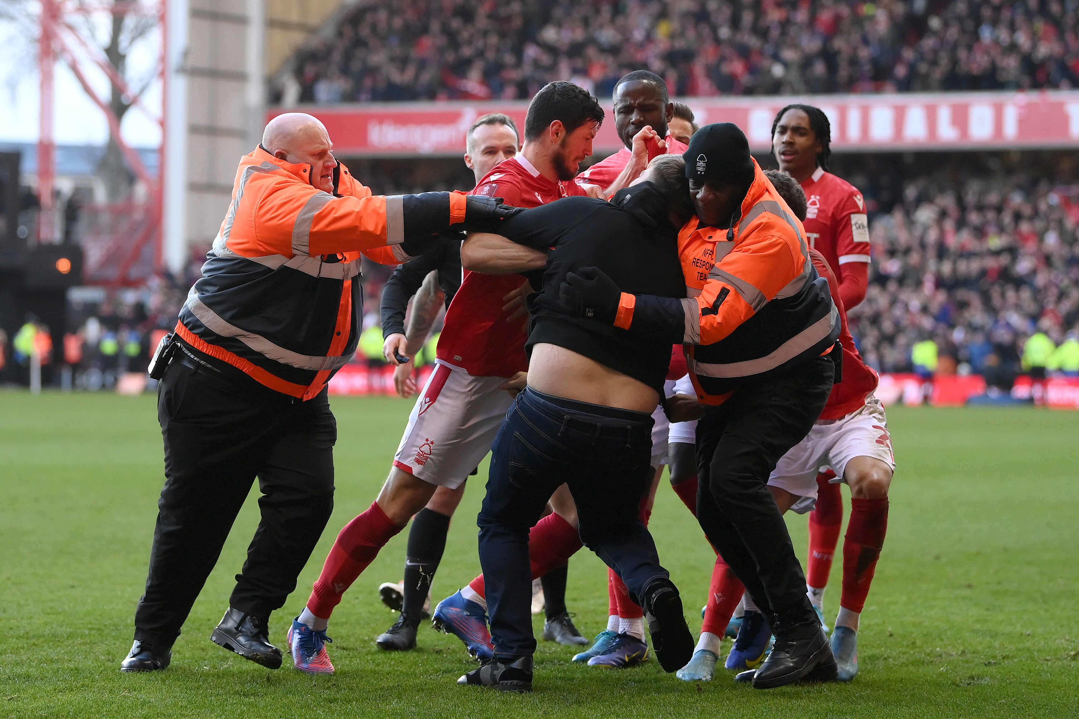 A fan entered the pitch and assaulted Forest players