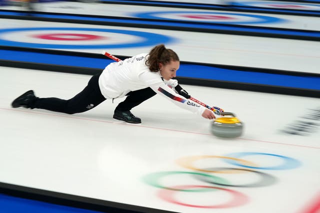 <p>Jen Dodds launches a stone during the match against Norway </p>