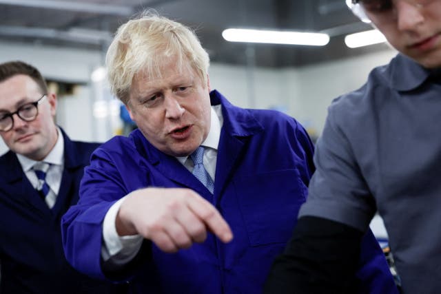 Prime Minister Boris Johnson during a visit to the technology centre at Hopwood Hall College in Manchester (Jason Cairnduff/PA)
