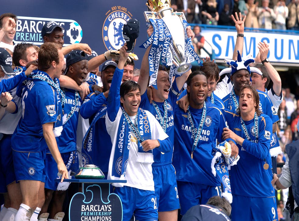 John Terry lifts the Premier League trophy after beating Manchester United (Sean Dempsey/PA)