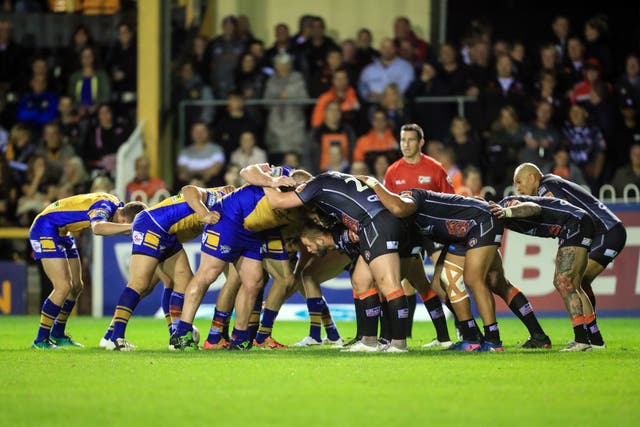 Castleford Tigers and Leeds Rhinos contest a scrum during Super 8s match at the Mend-A-Hose Jungle (Danny Lawson/PA)