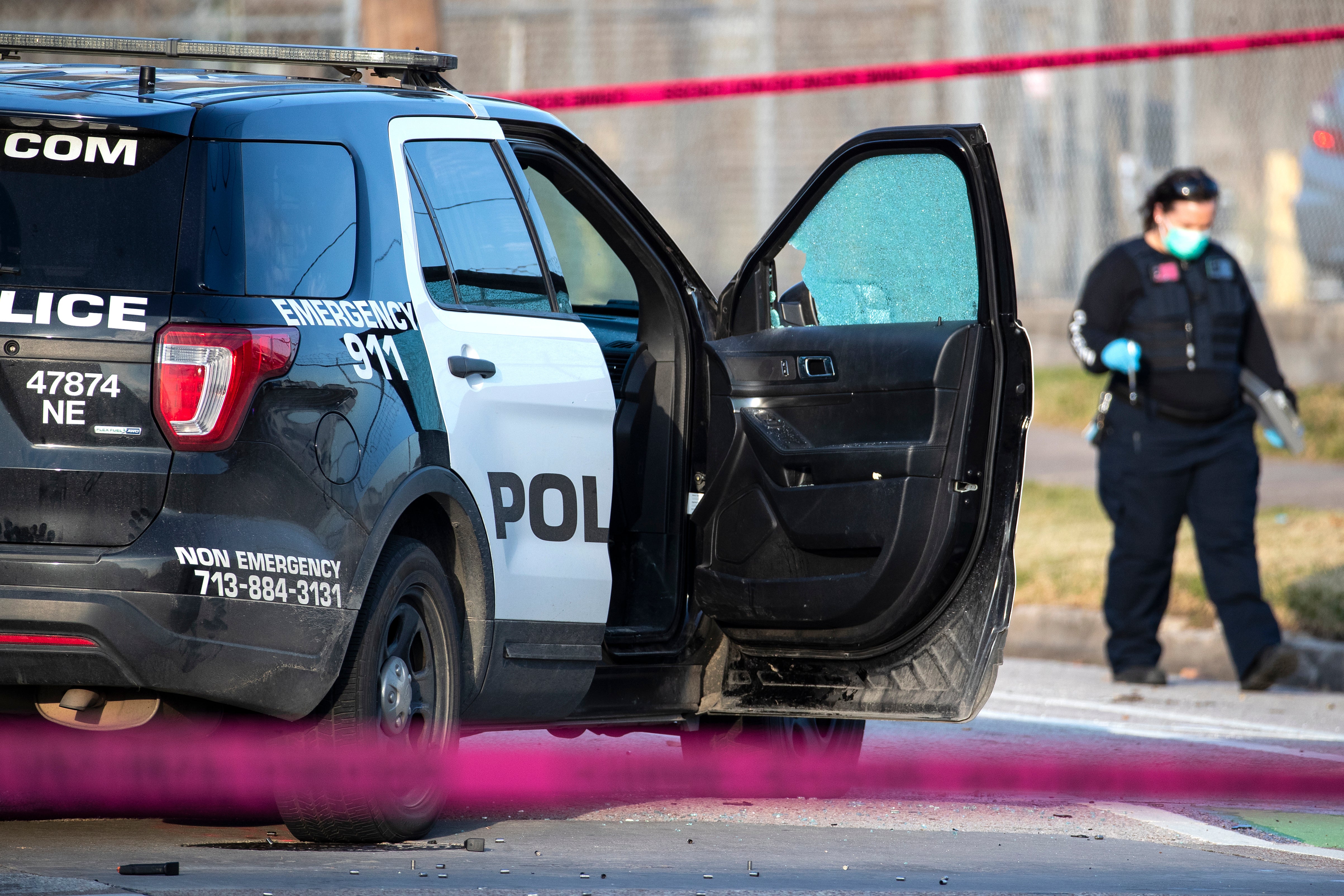 File Houston police department investigating a crime scene on 27 January 202