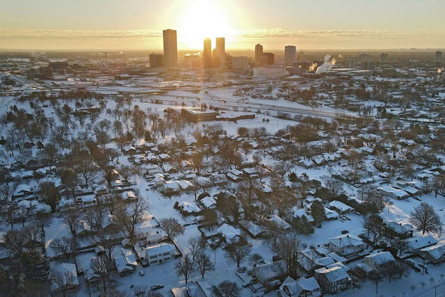 <p>The sun rises over Tulsa, Oklahoma, after a major winter storm cut electric power to about 350,000 homes and businesses from Texas to the Ohio Valley.</p>