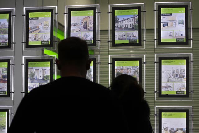 The average UK house price hit a record high of £276,759 at the start of 2022 after increasing by around £24,500 over the past year, according to Halifax (Yui Mok/PA)