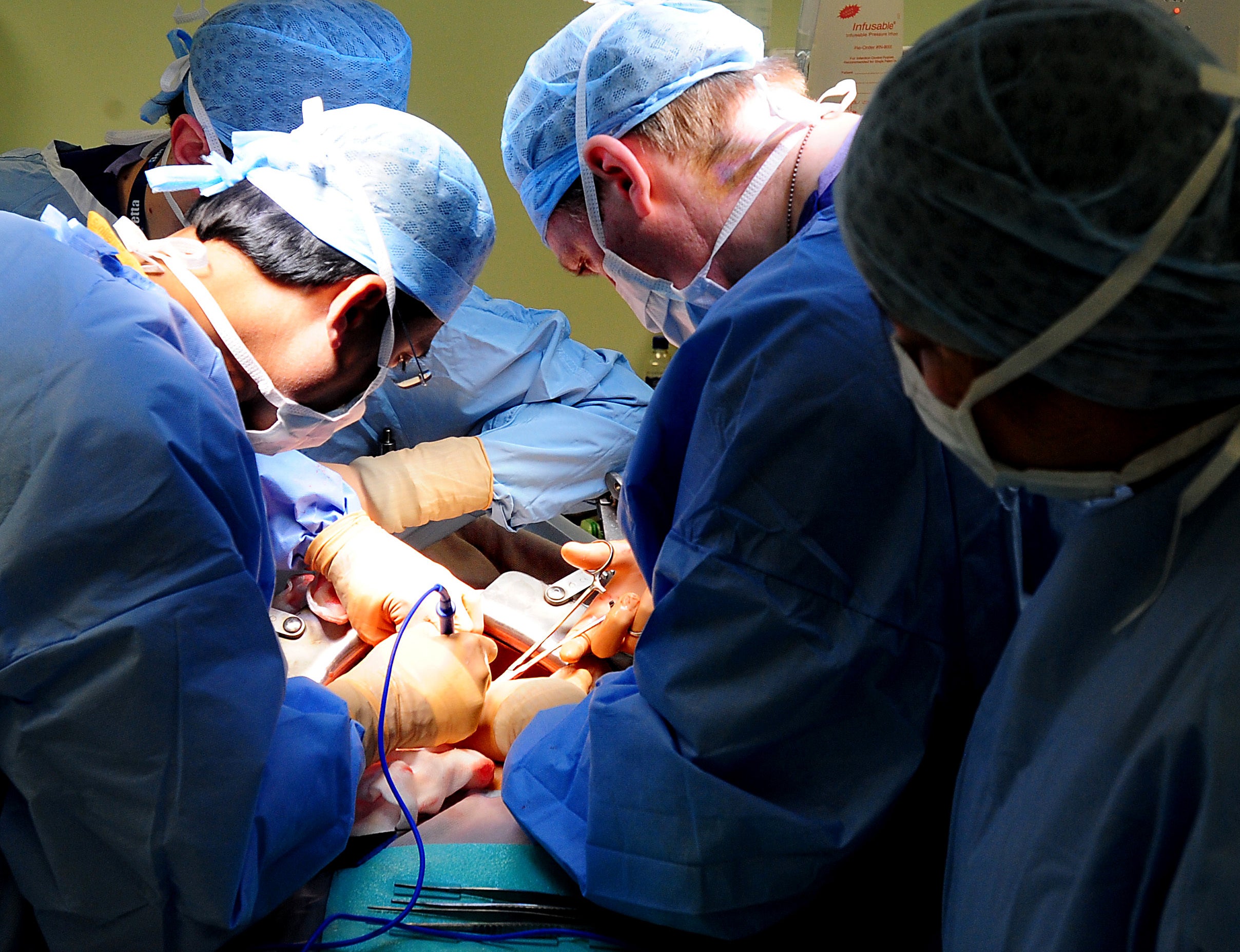 An operation taking place at Queen Elizabeth Hospital, Birmingham (Rui Vieira/PA)