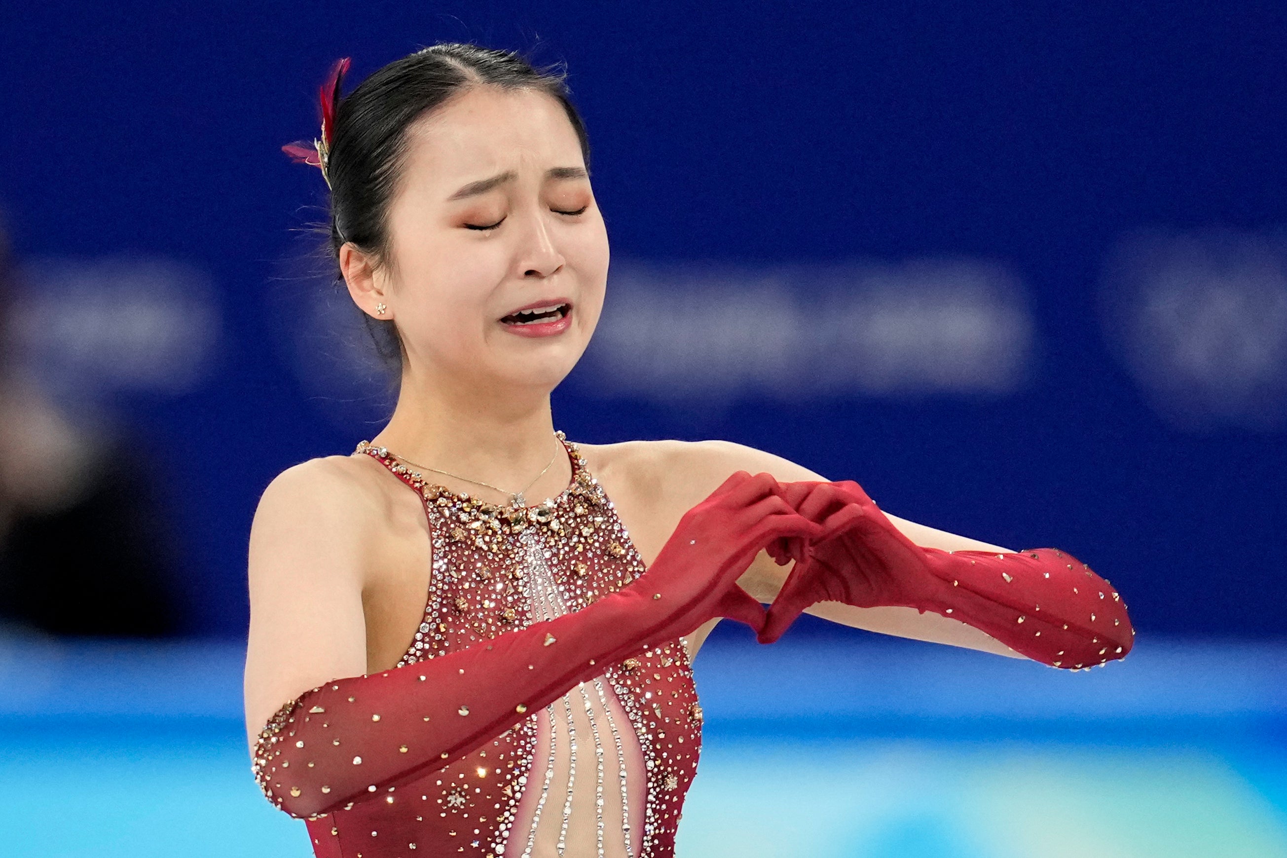 <p>China’s Zhu Yi reacts after the women’s team free skate programme during the figure skating competition at the 2022 Winter Olympics on Monday in Beijing</p>