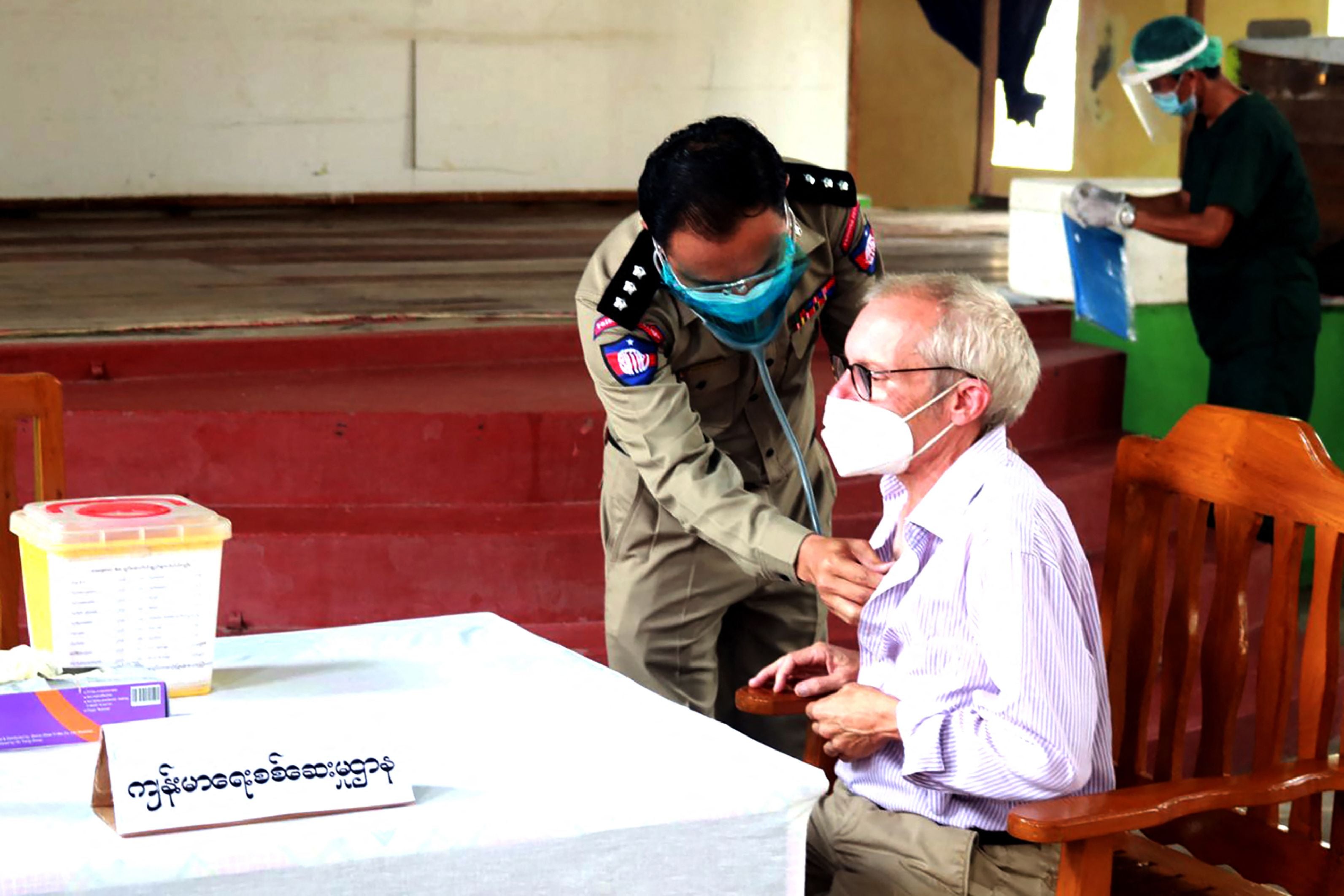 File photo: Sean Turnell, a detained Australian adviser to Myanmar’s deposed leader Aung San Suu Kyi, getting vaccinated in Insein prison in Yangon on 28 July 2021