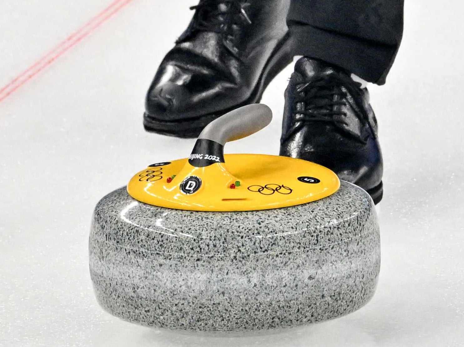 Each curling stone has a set of lights