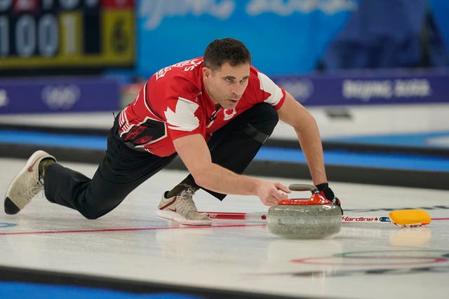 <p>John Morris, of Canada, throws a rock during the mixed doubles curling match against the Czech Republic</p>
