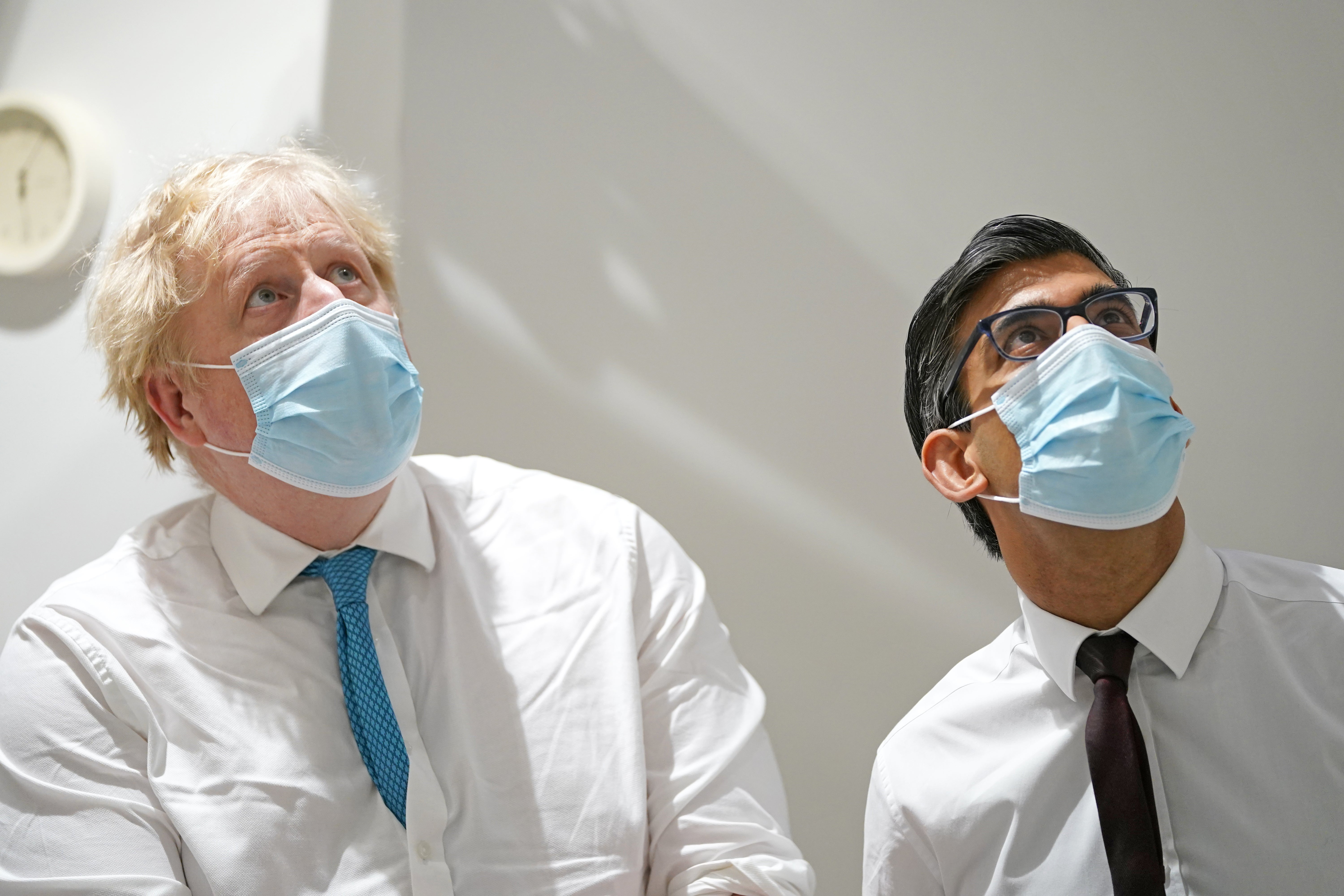 Prime Minister Boris Johnson and Chancellor Rishi Sunak during a visit to the Kent Oncology Centre at Maidstone Hospital (Gareth Fuller/PA)