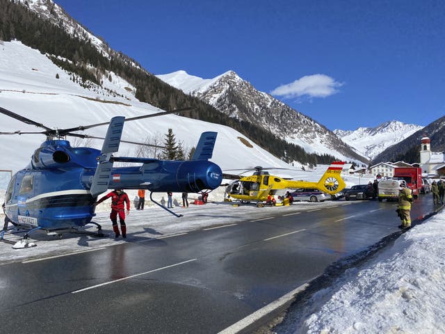 <p>Rescue helicopters stand on a street near the Gammerspitze after an avalanche killed one person </p>