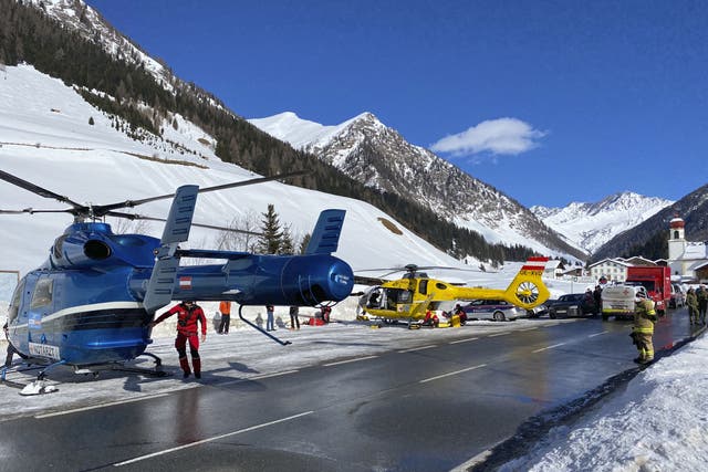 <p>Rescue helicopters stand on a street near the Gammerspitze after an avalanche killed one person </p>