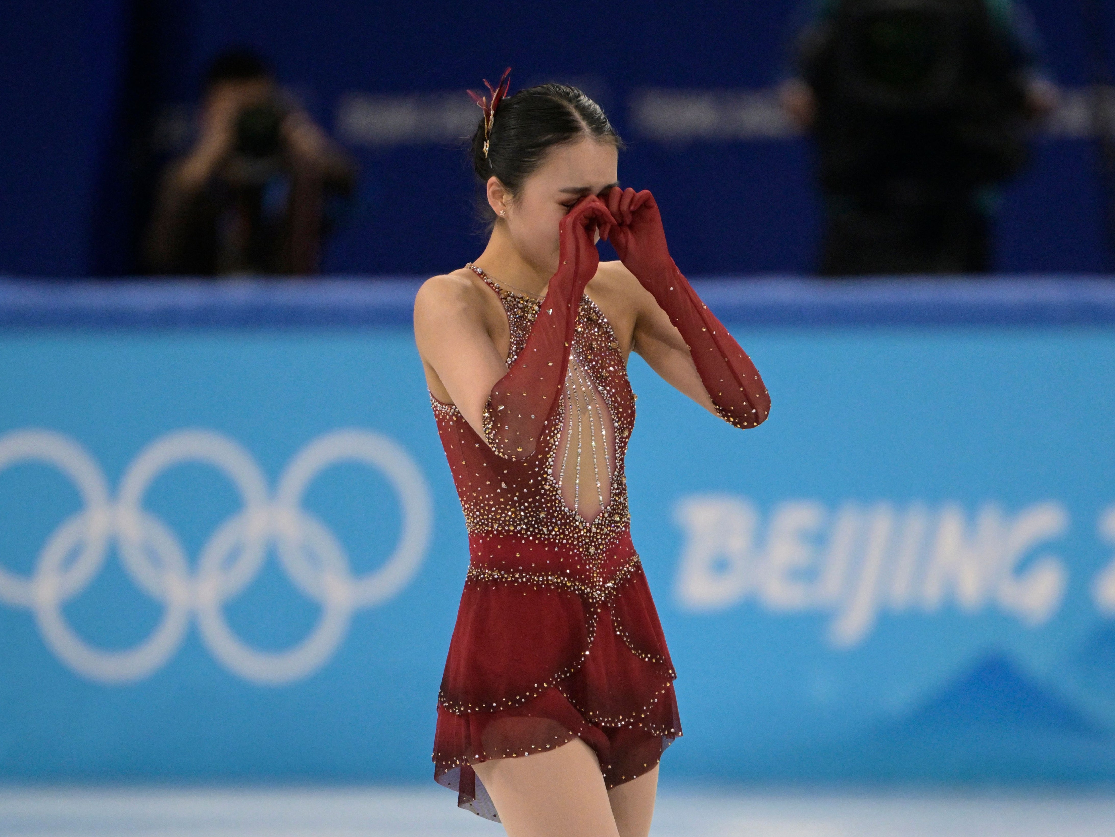Chinese figure skater left in tears after falling for second time during Winter Olympics The Independent image