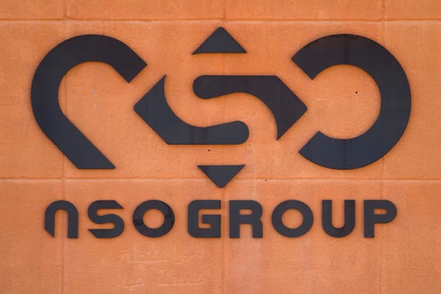 <p>File photo: The logo of Israeli cyber company NSO Group seen at one of its branches in the Arava Desert on 11 November 2021 in Sapir, Israel</p>