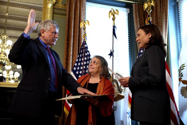 <p>Eric Lander allegedly created a toxic workplace and retaliated against staff who raised concerns about his behaviour. Here he is seen being sworn in by VP Kamala Harris as his wife Lori watches</p>