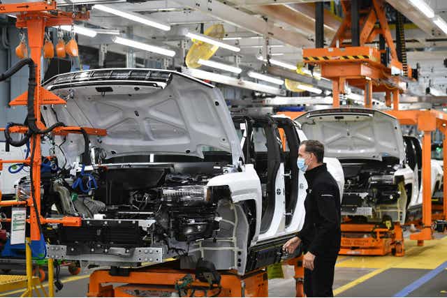 <p> GMC Hummer EVs on an assembly line at the General Motors Factory ZERO electric vehicle assembly plant in Detroit, Michigan in November</p>